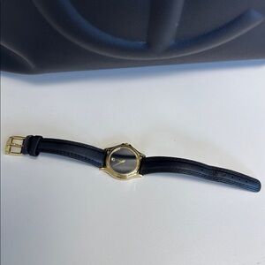 Movado Black and Gold Classic Watch